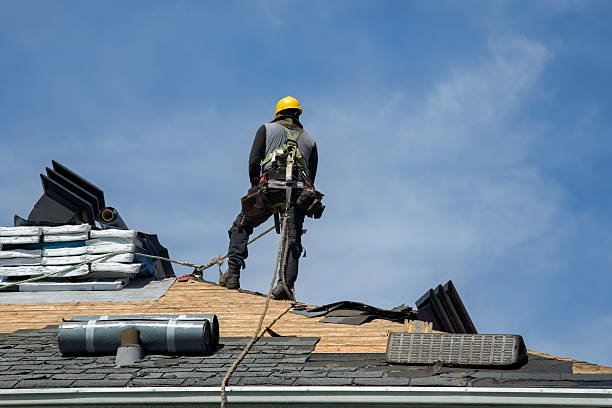 Professional Gutter Installation technician working in Essex Junction, VT